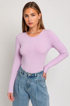 Say hello to our Carmen Ribbed Bodysuit with it's a Round Neck with Long Sleeves - a must-have essential for any wardrobe! Constructed from ribbed material, this bodysuit gives you the best of both worlds with its texture and stretch for a cozy fit. The long sleeves and round neckline offer coverage and warmth, making it an ideal choice for layering or flaunting solo. Model is 5'8" wearing a size smallFabric Contents: 92% Rayon 8% Spandex, Stretch fabric, Non-sheer fabricCare Instructions: Machine wash cold, gentle cycle, tumble dry low.Size Measurement (inch): XS: 14.0 (Bust), null (Waist), null (Hips), 26.5 (Length) S: 14.5 (Bust), null (Waist), null (Hips), 27.0 (Length) M: 15.0 (Bust), null (Waist), null (Hips), 27.5 (Length) L: 15.5 (Bust), null (Waist), null (Hips), 28.0 (Length) Trending Tops, Plus Swimwear, Ribbed Bodysuit, Cozy Fits, Sheer Fabrics, Ribbed Fabric, Print Pattern, Spandex Fabric, Bottoms Pants