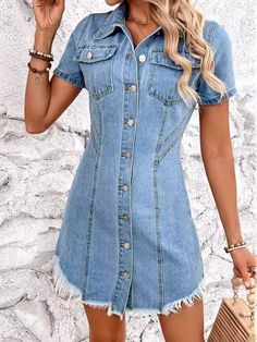 Denim Short Sleeve Button Front Minimalist Blue Jean Distressed Mini Shirt Dress This retro denim dress is a classic summer choice for any woman who wants to make a statement in a minimalist way.Vintage style with a modern contemporary twist making this a playful choice.Collar neckline and full button front closure lends to simplicity while the round torn raw hem mini length gives a edgy touch.Functional chest pockets gives a girl-next-door 80s vibe.Vertical and asymmetrical seams with a light s Short Sleeve Denim Dress, Short Sleeve Denim, Plus Size Activewear, Swimwear Cover Ups, Mini Shirt Dress, Swimwear Cover, Charming Charlie, Formal Evening Dresses, Denim Dress