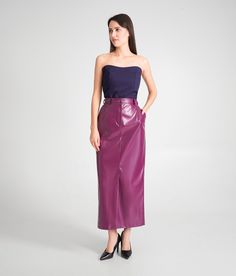 A faux leather skirt featuring a high-rise styling, maxi length, and a front slit. - Fitted pencil silhouette - High waist - Maxi length  - Front slit - Front zipper closure+metal snap - Two front pockets Color: purple/black  Fabric: polyestaer - 60%, nylon - 36%, elastane - 4% Our model wears size 36 EU / 2 US and is 168 cm / 5'6" tall. MORE ITEMS: https://www.etsy.com/shop/TAVROVSKA?ref=hdr_shop_menu Leather Maxi Skirt, High Waist Pencil Skirt, Faux Leather Pencil Skirt, Vegan Leather Skirt, Skirt Purple, Ankle Length Skirt, Aline Skirt, High Waisted Pencil Skirt, Faux Leather Skirt