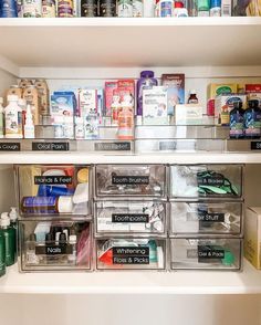 an organized pantry with clear bins filled with personal care items