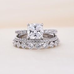 an engagement ring set with a cushion cut diamond