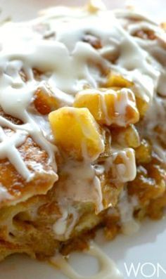 a white plate topped with food covered in icing