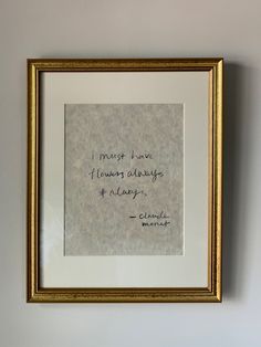 a framed photograph with a quote on the wall above it that reads, i must have known always and always