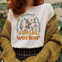 Retro Floral Social Worker Shirt, School Social Worker Sweatshirt, Gift For Social Worker, Flower Sweatshirt, Wildflower shirt, Gift For Her MATERIAL UNISEX T-SHIRT - Medium fabric (5.3 oz/yd² (180 g/m - Classic fit - Runs true to size - 100% cotton (fiber content may vary for different colors) - Tear-away label UNISEX SIZING CHART: Small: Length 28" - Width 18" (4-6) Medium: Length 29" - Width 20" (6-10) Large: Length 30" - Width 22" (10-14) XL: Length 31" - Width 24" (14-18) 2XL: Length 32" - Social Work Shirt Ideas, Social Work Shirt Designs, School Social Worker Shirts, Social Worker Sweatshirt, Social Worker Outfits, Social Workers Office, Licensed Social Worker, School Social Worker, Social Worker Gifts