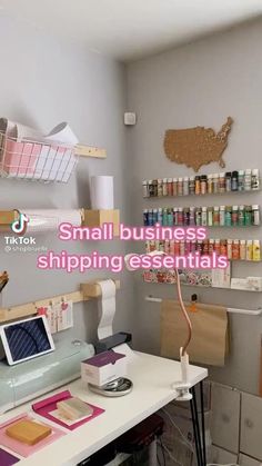 small business shipping essentials displayed on the wall in a craft room with sewing supplies