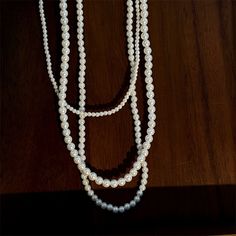 Material: Imitation pearl Fashion Element: Pearl Style: Simple Pearl White Beaded Necklaces With Clavicle Chain, Pearl White Beaded Necklaces For Jewelry Making, Pearl White Beaded Necklace With Pearl Pendant, Pearl White Beaded Necklaces With Round Beads, Pearl White Beaded Pearl Necklace, Pearl Necklace With Beaded Chain, Pearl Fashion, Pearl Necklace Designs, Small Beads