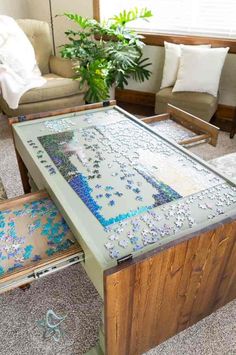 a coffee table made out of puzzles in a living room