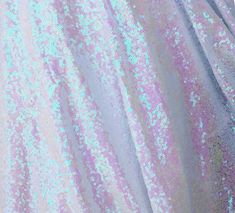 Pearl Iridescent Sequin Fabric, Glitter Sequins Fabric for Dress, Full Sequin on Mesh Fabric, White & Pink Iridescent Sequins Fabric by the Metre. A special and limited fabric is composed of sparkling sequins sewed on a stretch mesh fabric. Perfect Party dress fabric for any occasion Great for making dress, tablecloths, photo backdrop, ring cushion, decorative cushion, table decoration, wedding ceremony! Medium weight and easy to work with. Roll Width:  approx. 120cm or 47" Weight: 240gr/m2 Slig Iridescent Sequin, Sequins Fabric, Fabric Glitter, Stretch Mesh Fabric, Cushion Ring, Diamond Bar, Sequins Embroidery, Pixie Dust, Sequin Fabric