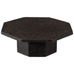 an octagonal table with black granite top and square base, viewed from the front view