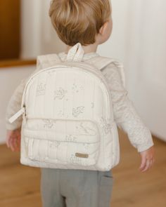 This mini backpack has a zipper main compartment at the front and adjustable shoulder straps and top handle for any way your little one wants to carry it. Featuring our ‘dragons’ all-over print on natural. Size: 10 in x 9 in x 3 in Shell: 100% Cotton; Lining: 100% Cotton; Padding: 100% Polyester Sock Booties, Book Baskets, Toddler Backpack, Basket Bag, Hair Accessories Jewelry, Mini Backpack, Baby Bag, Burp Cloths, Doll Accessories