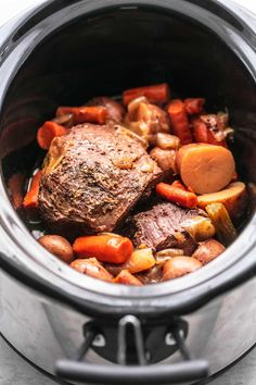 the meat and vegetables are cooked in the slow cooker for dinner or soup,