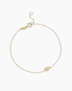 This Diamond Vintage Heart Bracelet is a timeless style that's perfect for everyday wear. Featuring a vintage-inspired heart charm with a dainty diamond and an adjustable solid gold chain, it adds a touch of elegance to any stack.  This heart bracelet is a thoughtful gift for anniversaries and other special moments. Diamond Vintage Heart Bracelet in 14k Solid Gold, Women's by gorjana Classic Gold Heart Bracelet, Classic 14k Gold Diamond Bracelet With Adjustable Chain, Delicate Adjustable Yellow Gold Diamond Bracelet, Adjustable Delicate Yellow Gold Diamond Bracelet, Classic Everyday Heart Charm Bracelet, Delicate Yellow Gold Diamond Bracelet With Chain, Delicate Yellow Gold Diamond Bracelet With Delicate Chain, Classic Gold Heart Bracelet For Everyday, Gold Classic Heart Bracelet For Everyday Wear