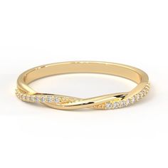 a yellow gold wedding band with white diamonds