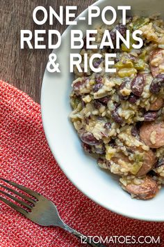 one pot red beans and rice in a white bowl with a fork next to it