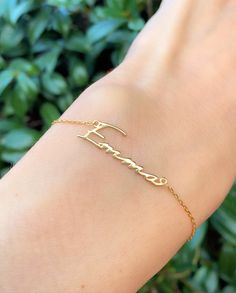 This personalized bracelet will carry your name or your beloved ones on your skin! Very dainty and elegant ✨ Perfect choice as a special gift ❤️ Fits every size with its extension! 14K gold vermeil on 925 Sterling Silver ✨ Details: Length of bracelet : 15.3cm (6 inches) Extention: 5 cm( 2 inches) Length of name: 2.5cm (1 inch) This bracelet arrives in a charming gift package wrapped with love ❤️ . . . . . . . . . . . . . . . . . . . . . . . . . . . . . . . . . . . . . . . . . . ★ You can check o Custom Name 14k Yellow Gold Bracelet, Customizable Yellow Gold Name Bracelet, Custom Name Gold Bracelets, 14k Gold Initials Name Bracelet For Anniversary, Minimalist Gold Plated Name Bracelet As Gift, 14k Gold Name Bracelet With Initials For Anniversary, Minimalist Gold Plated Name Bracelet For Gifts, Custom Name 14k Gold Dainty Bracelet, Personalized Nameplate Bracelet In 14k Gold