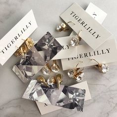 "Simple, gorgeous, elegant and classic. These earrings are perfect for brides and bridesmaids! DETAILS: - Made with Swarovski crystal stones - Available in silver, gold or rose gold - 1\" length - .5\" width - Lightweight, easy to wear - Nickel and lead free - Securely packaged in a signature gift box - Easy returns SHOP THE COLLECTION: https://www.etsy.com/shop/TigerlillyCouture PERSONALIZATION: We would love to personalize your earrings! On the shopping cart page, near the bottom left, is a bo Classic Party Crystal Earrings With Ear Wire, Faceted Drop Earrings For Wedding, Elegant Gold Faceted Crystal Earrings, Faceted Crystal Earrings For Formal Occasions, Elegant White Faceted Crystal Earrings, Teardrop Faceted Crystal Earrings For Weddings, Faceted Teardrop Crystal Earrings For Wedding, Elegant Faceted Dangle Teardrop Earrings, Faceted Crystal Earrings For Wedding