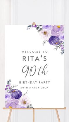 a sign that says welcome to riata's 90th birthday party with purple flowers