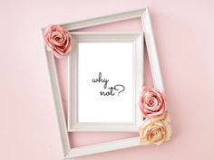 a white frame with pink flowers and a quote in it on a pink wall background