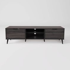 an entertainment center with two drawers and one door on the side, in dark wood