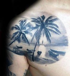 a man's back with palm trees and boats on the beach