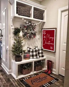 the entryway is decorated with christmas decorations and wreaths