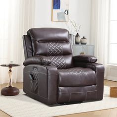 a brown recliner chair sitting on top of a white rug