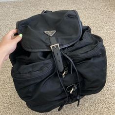 Prada Black Nylon Large Backpack Condition: Excellent, Preloved With Light Signs Of Use. Backpack Strap Has Some Residue And Creases. There Is Minor Color Fading Through The Backpack But No Other Major Callouts. Please Review All Photos And Video Carefully And Keep In Mind This Is Preloved And Signs Of Use Will Be Visible. Comes With Authenticity Verification Card Any Questions Or Concerns Please Comment Or Message Below Designer Black Nylon Backpack, Large Backpack, Backpack Straps, Black Nylons, Lighted Signs, Prada Bag, Prada, Bag Lady, Backpacks