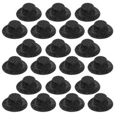 black sponges are arranged in the shape of a heart on a white background photo