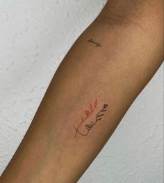 a woman's arm with a tattoo on it that reads, i love you