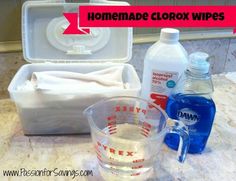 homemade clorox wipes are on the counter next to a measuring cup and container