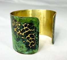 These unique, hand-formed copper and brass cuff bracelets with vibrant patinas create stunning accents to your personal style. Dress up or down- either way you'll be wearing an adornment that will turn heads, start conversations, and delight the eye of the beholder. This is a customizable hammered brass cuff with a gorgeous Tiffany or Light Green patina. Order yours in your favorite color, width and size (length). Tiffany tends to have marbled blues/teal and a little lighter green, whereas Green Handmade Brass Cuff Bracelet, Adjustable Gold Cuff Bracelet With Patina, Unique Green Cuff Bracelet Bangle, Unique Green Cuff Bangle Bracelet, Unique Green Bangle Cuff Bracelet, Unique Green Metal Cuff Bracelet, Handmade Green Metal Cuff Bracelet, Unique Brass Cuff Bracelet, Green Handmade Metal Cuff Bracelet