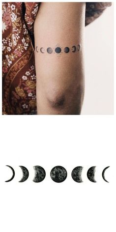 the phases of an eclipse tattoo on someone's left arm, and in front of them