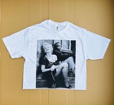 Brand new shirt, 100% cotton, white color, Men's sizes but look great on women as well. Shipping from California. Measurements approx: Length x width  S= 17x17  M= 19x20   L= 21x21  XL= 23x23 White Cropped T-shirt With Screen Print For Streetwear, White Oversized Cropped T-shirt For Streetwear, White Cropped Shirt For Streetwear In Spring, White Cropped Shirt For Spring Streetwear, White Graphic Tee Cropped Shirt For Spring, White Cropped Streetwear Shirt, Oversized White Cropped T-shirt, Spring White Graphic Tee Cropped Shirt, White Cropped Shirt For Streetwear