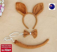 a mouse ears headband with a bow tie