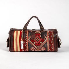 Artihandmade™ Leather Bag Are you looking for a fashion and trendy travel bag, for travelers who apreciate craftsmanship and handmade design. This kilim bag is a Must-Have for your outgoing trips due to the creative kilim patterns and high quality materials. We offer you a unique and light bag with real leather hand-dyed tanned you will certainly be in harmony with the cool and natural look. Easy to carry for Clothing-Traveling and Sports , With Two Side Pockets And Two In Interior For Accessori