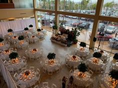 an overhead view of a banquet hall with tables and chairs set up for formal function