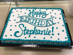 a birthday cake with blue and white frosting that says happy birthday stephanie on it