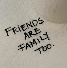 the words friends are family too written on a towel