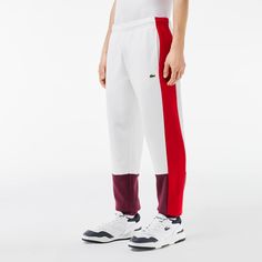 These creative sweatpants are the result of 90 years of Lacoste fashion and sportswear expertise, featuring concealed pockets on the sides. Made from super-soft brushed fleece, with an iconic colorblock design cut and sewn from two or three fabrics.