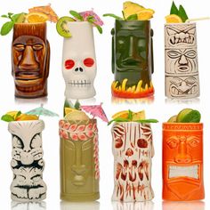 a group of different types of tiki glasses