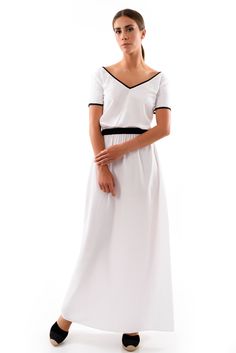 Effortlessly stylish white summer maxi dress with an elegant black trim - classic monochrome chic. Flattering v-neck design carried through to the back of the dress. Comfortable elasticated waist and gathered fabric design. Easily dressed down with trainers or up with heels and jewellery.  The sizing is generous. The small size is bust: 83-88cm, waist: 65-70cm, hips: 91-96cm with a little give either side. White V-neck Stretch Maxi Dress, White Stretch V-neck Maxi Dress, Elegant White Maxi Dress With Elastic Waistband, Chic White Maxi Dress With Elastic Waistband, White Maxi Dress With Elastic Waistband For Summer, White Maxi Dress With Elastic Waistband, Elegant White Dress With Elastic Waistband, White Maxi Dress With Elastic Waistband For Daywear, White Summer Maxi Dress