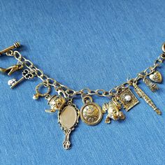 This Is A Soozi's Closet Item (A1) Description: Length Of Bracelet From End To End: Approx. 7.5" (Can Be Shortened Approx. 1") Length Of Bracelet From End To First Circle To Close The Bracelet: Approx. 6.5" This Is A Lovely Faux Antiqued Gold-Tone Charm Bracelet. There Are 11 Charms On The Bracelet (Please See Photos). Toggle Closure. New Without Tags. Please Check Out All Photos, As They Are Part Of The Description. Ask Questions. Make A Reasonable Offer, And I Will Probably Accept, Or Counter Antique Charm Bracelet, Layering Bracelets, Bridesmaid Proposals, Plastic Bangles, Diy Jewlery, Adjustable Bangle Bracelet, Vintage Charm Bracelet, Xmas List