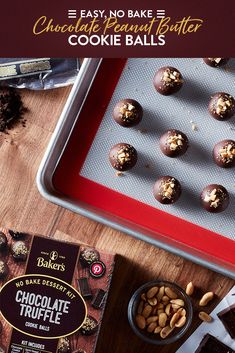 chocolate truffles on a baking sheet and some nuts in a bowl next to it