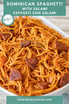 a bowl filled with spaghetti and meat on top of a wooden table