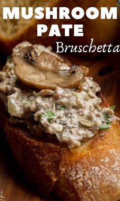 mushroom pate on top of bread with mushrooms in the background