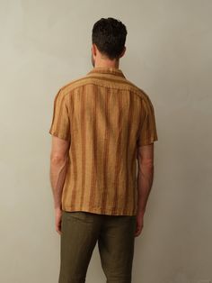 Camp collar shirt in embroidered French linen. Garment washed for an extra soft hand. Fit: Model is wearing size M. Fits true to size. Bowling collar with a straight hem. Material: 100% European Flax. Coconut shell buttons. Care: Machine wash cold with like color. Tumble dry low. Do not bleach. Cool ironing. Origin: Made in Portugal. Vintage Linen Shirt With Relaxed Fit, Casual Embroidered Linen Tops, Vintage Linen Tops With Relaxed Fit, Vintage Linen Top With Relaxed Fit, Embroidered Linen Tops With Relaxed Fit, Brown Shirt With Placket In Relaxed Fit, Casual Shirt With Natural Dye And Relaxed Fit, Brown Relaxed Fit Shirt With Placket, Embroidered Linen Shirt With Camp Collar