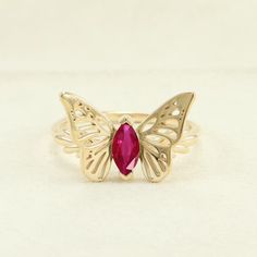 Adjustable Butterfly Ring For Anniversary In Fine Jewelry Style, Adjustable Butterfly Ring For Anniversary, Gold Butterfly Gemstone Ring For Wedding, Gemstone Butterfly Ring For Anniversary, Ruby Butterfly Ring, Luxury Butterfly Ring With Gemstone For Gift, Luxury Butterfly-shaped Ring For Gift, Luxury Gold Butterfly-shaped Ring, Wings Ring