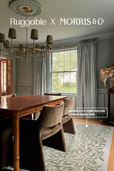 a dining room table with chairs and rug in front of a window that reads ruggable x morris & c