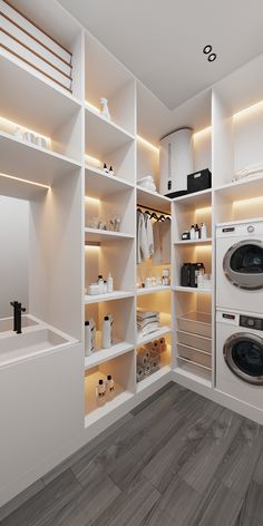 a washer and dryer in a room with white shelves on the wall, along with other appliances