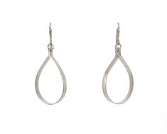 "These open teardrop hoop earrings are made from pure grade 1 titanium.  They are 1/8\" strips cut from titanium sheet then shaped and tumbled for a smooth satin finish. These earrings are completely nickel free and hypoallergenic, making them comfortable for anyone to wear. * Pure titanium  * Niobium ear wire option (drop down menu) * Earring drop length 1 1/2\", width 11/16\" * Lightweight * Nickel free  Pure titanium is considered the most hypoallergenic of all metals. It is commonly used in Contemporary Everyday Jewelry With Teardrop Shape, Contemporary Teardrop Jewelry For Everyday, Contemporary Teardrop Metal Jewelry, Modern Hypoallergenic Teardrop Jewelry, Contemporary Everyday Teardrop Jewelry, Formal Hypoallergenic Metal Teardrop Earrings, Modern Hypoallergenic Teardrop Pendant Jewelry, Metal Teardrop Hoop Earrings, Contemporary Teardrop Ear Wire Jewelry